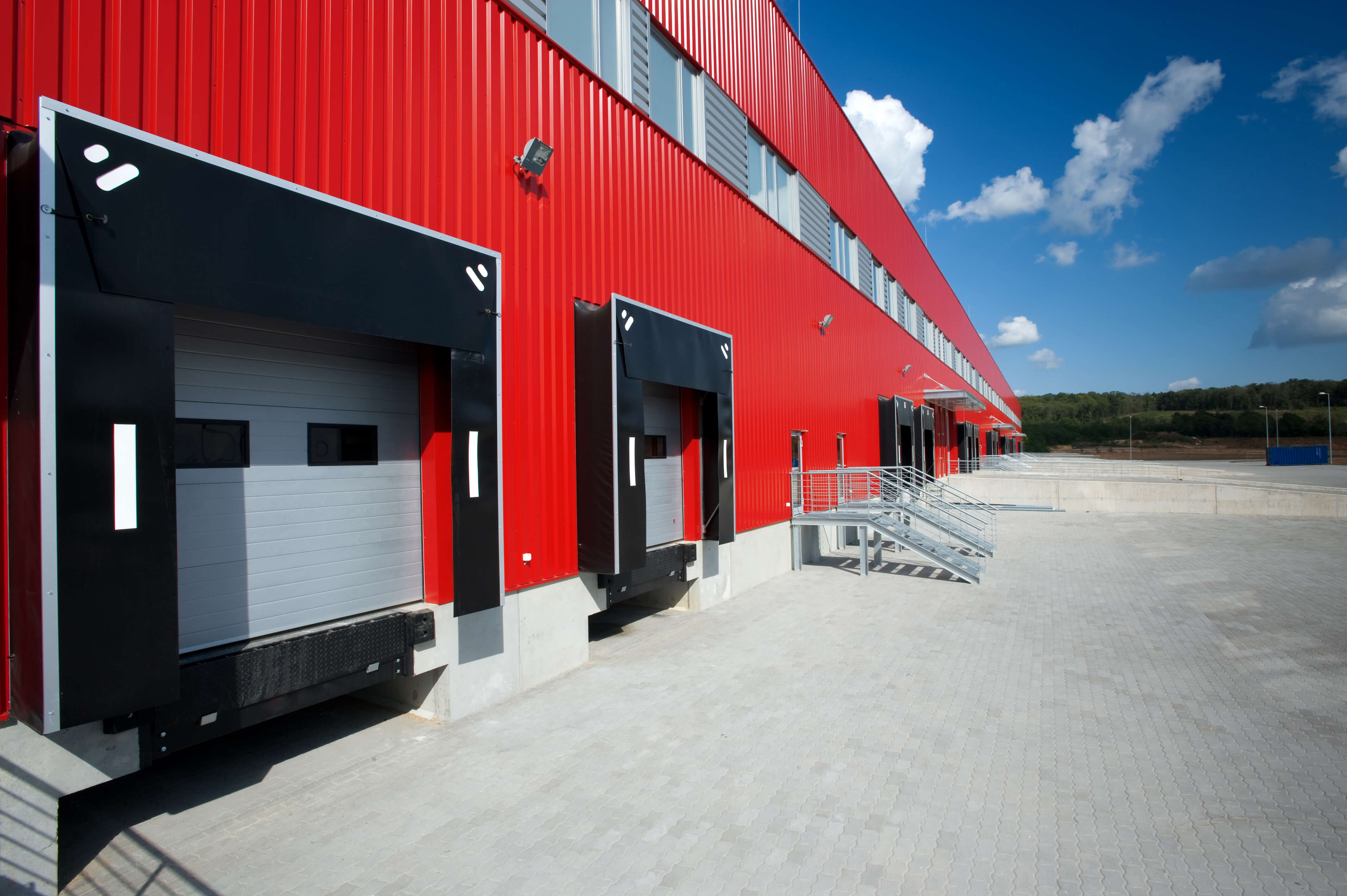 Red metal facade on modern warehousing unit